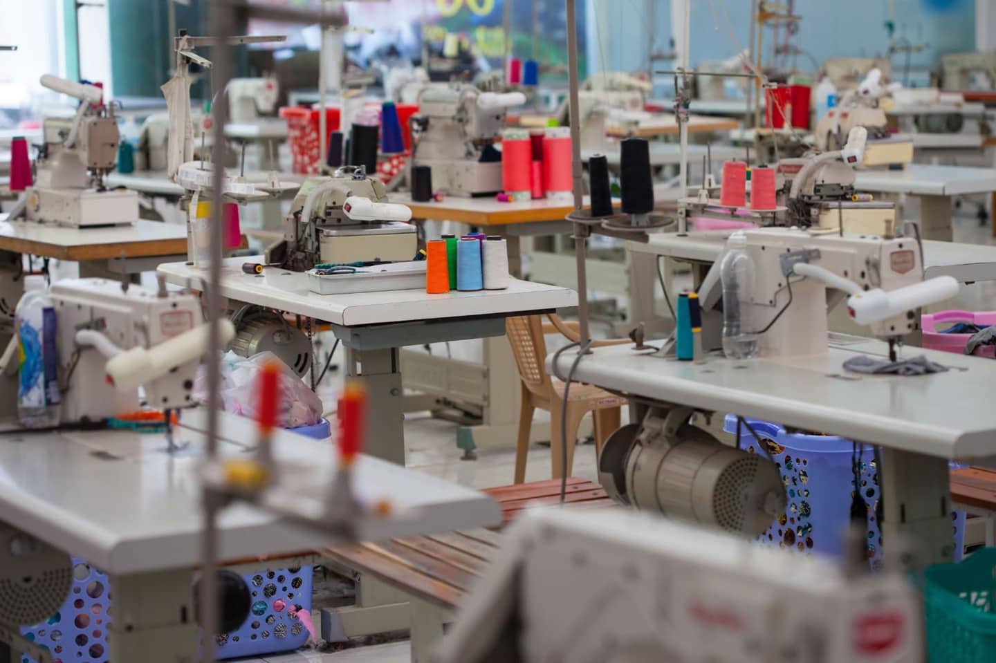 Sewing machines in a sew contractor facility