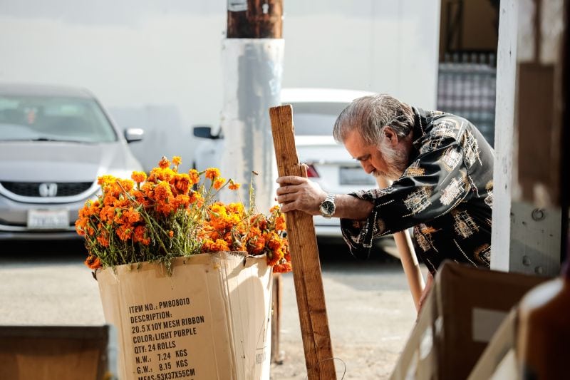 man disposing materials sustainably
