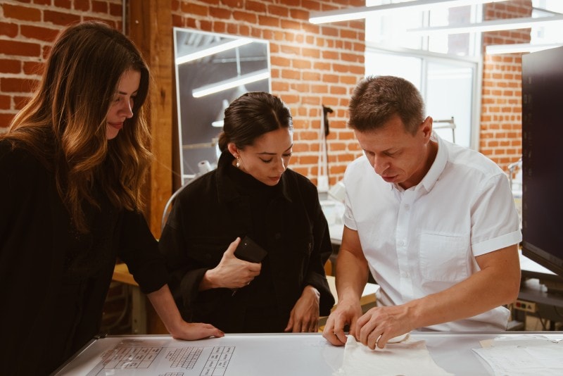 sourcing managers checking fabric quality