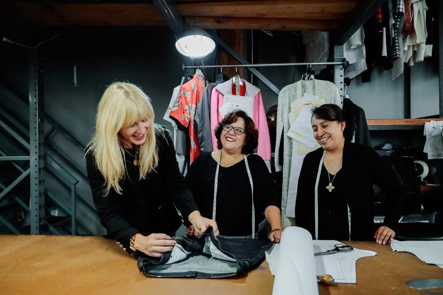 Jennifer Evans and two Los Angeles clothing manufacturers looking at new clothing made with natural fibers