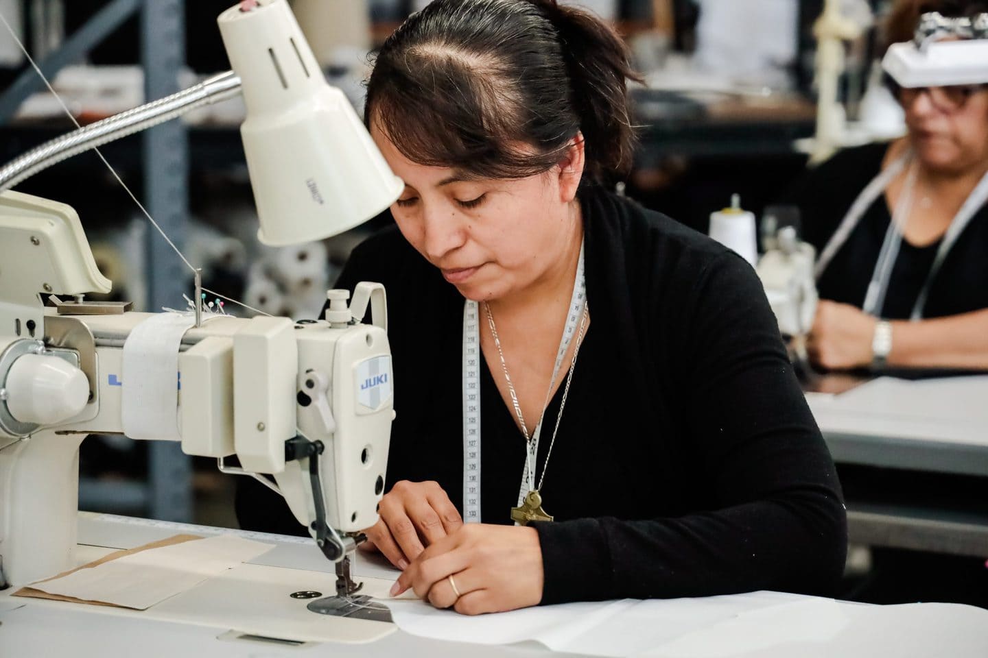 Seamstress working at a sewing machine