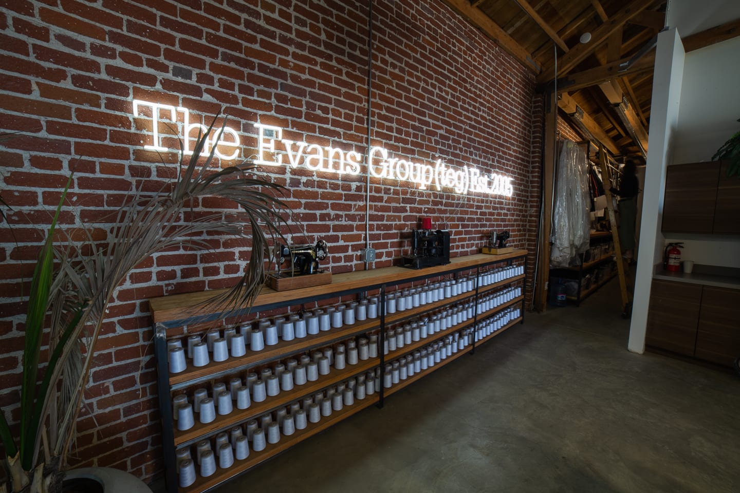 Neon sign logo of The Evans Group in Los Angeles